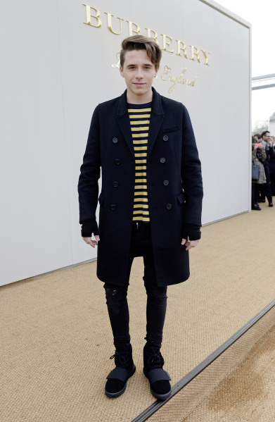 Brooklyn Beckham wearing Burberry at the Burberry Menswear January 2016
